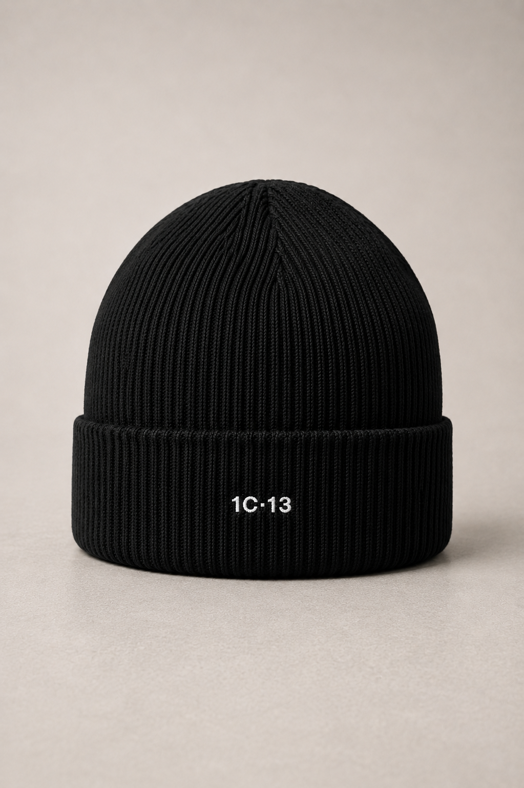 1C·13 Ribbed Beanie in Black, product detail with embroidered logo