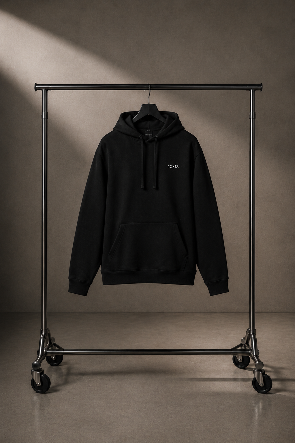 1C·13 Side-Pocket Hoodie in Black on hanger