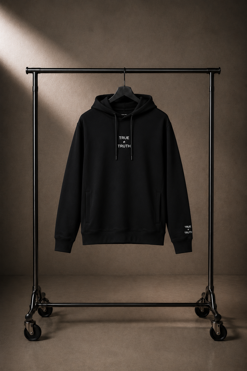 TRUTH Side-Pocket Hoodie in Black on hanger