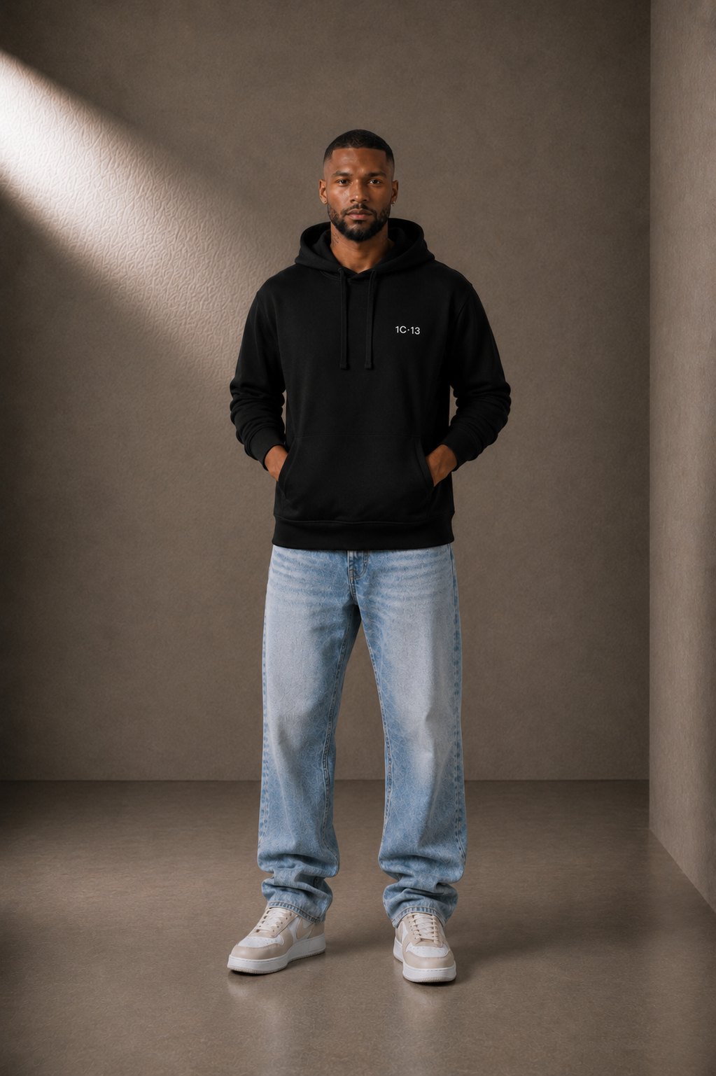 1C·13 Side-Pocket Hoodie in Black, front view on male model
