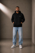 1C·13 Side-Pocket Hoodie in Black, front view on male model