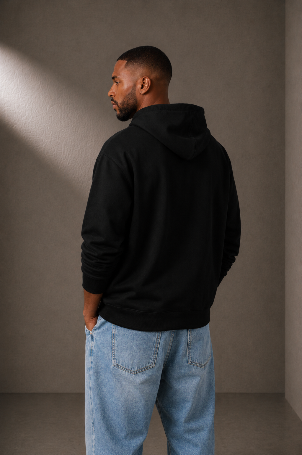 TRUTH Side-Pocket Hoodie in Black, back view on male model