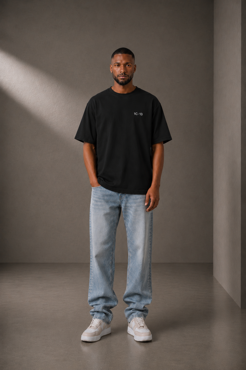 1C·13 High-Neck Tee in Black, front view on male model