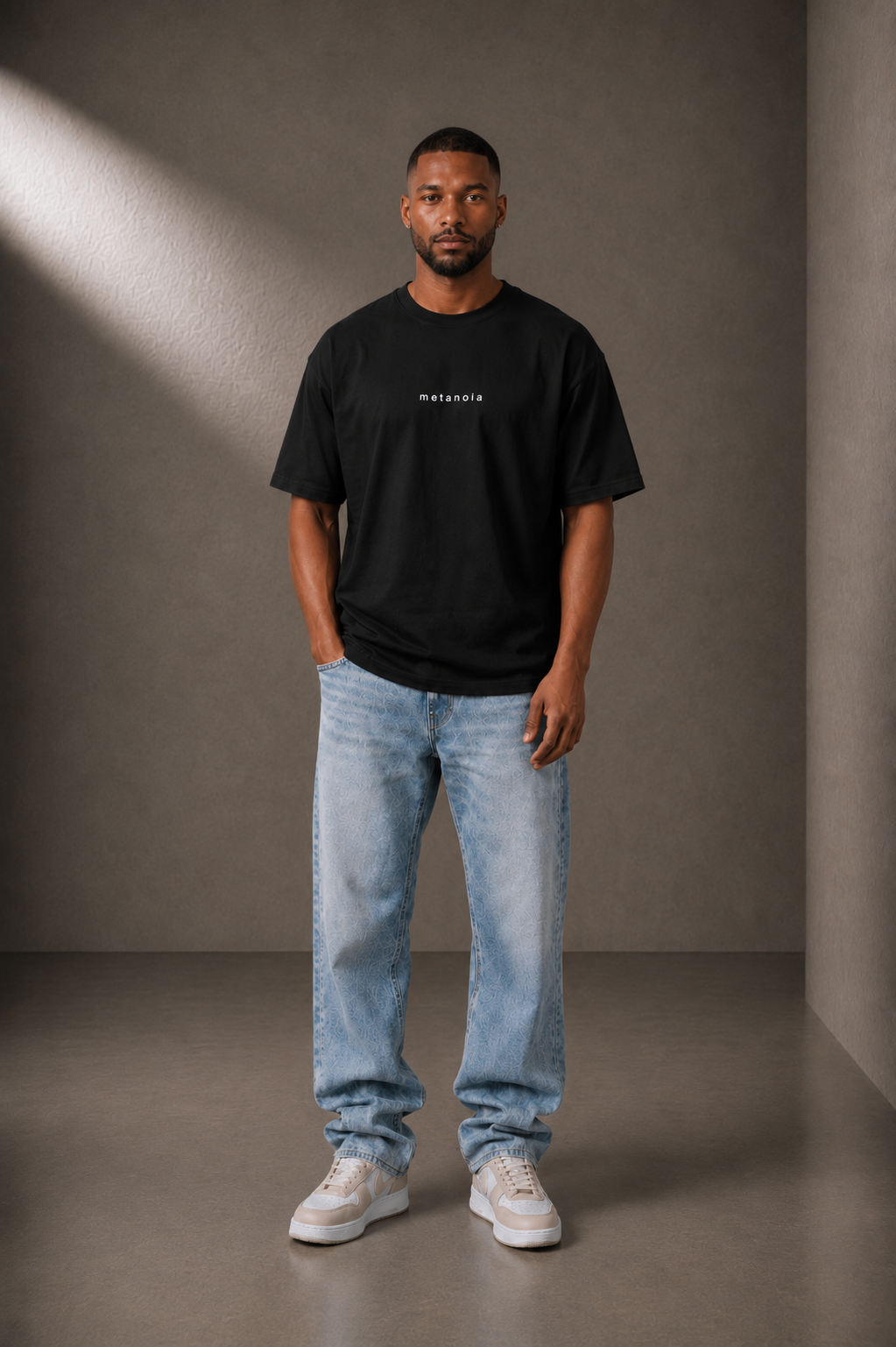 METANOIA High-Neck Tee in Black, front view on male model