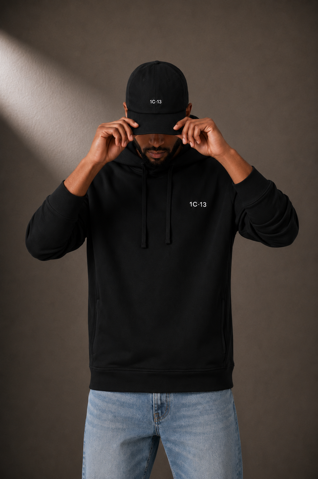 1C·13 Dad Cap in Black, head-down view on male model