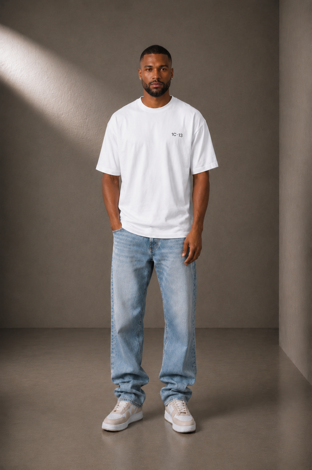 1C·13 High-Neck Tee in White, front view on male model
