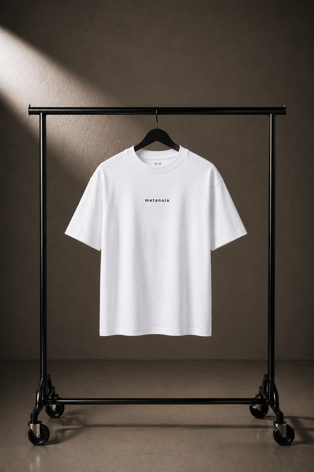 METANOIA High-Neck Tee in White on hanger