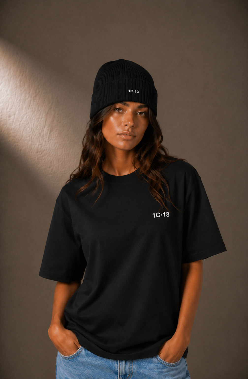 1C·13 Ribbed Beanie in Black worn by female model