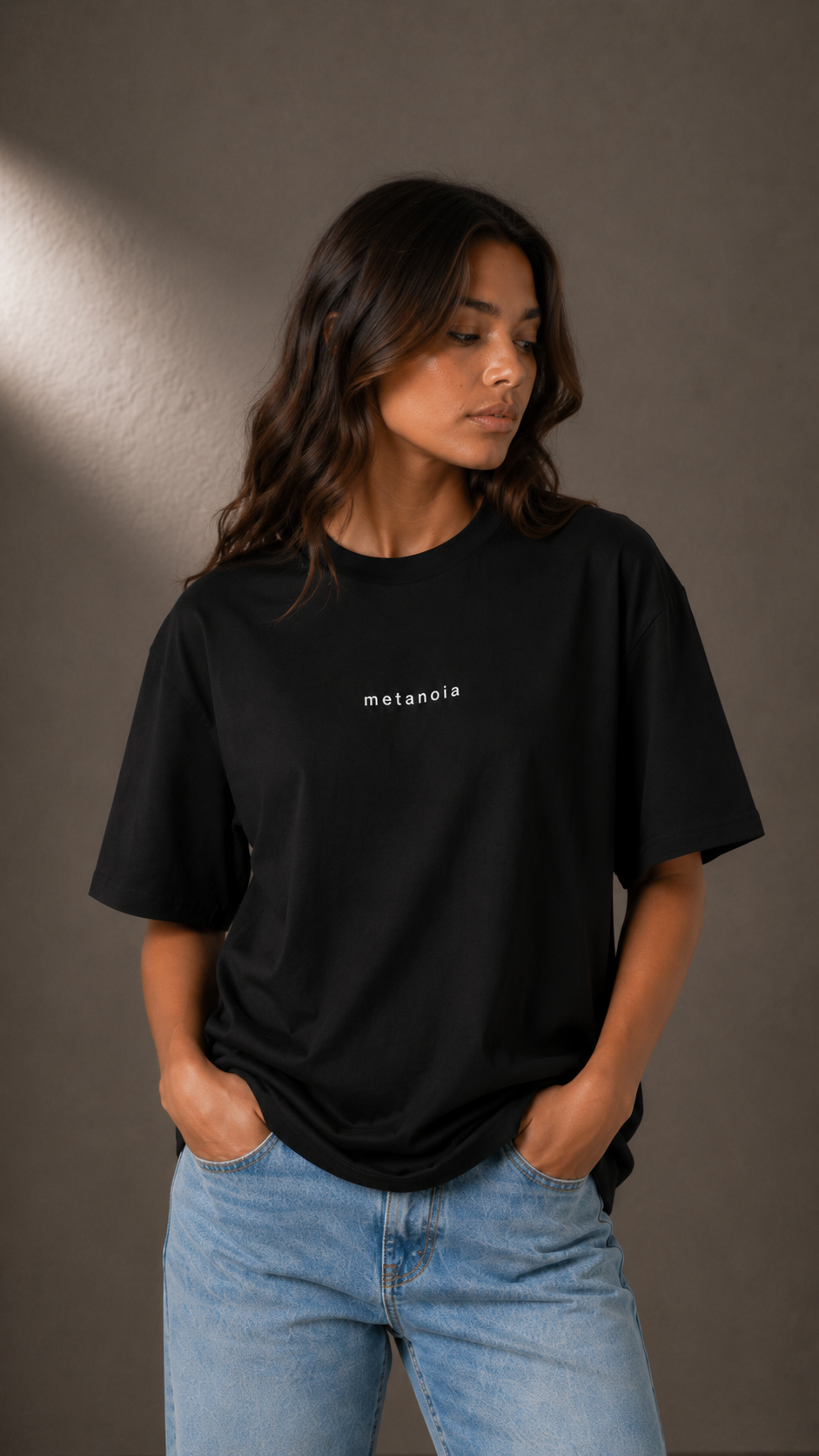 METANOIA High-Neck Tee in Black, front view on female model