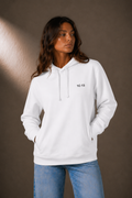 1C·13 Side-Pocket Hoodie in White, front view on female model