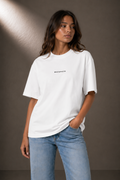 METANOIA High-Neck Tee in White, female model upper body